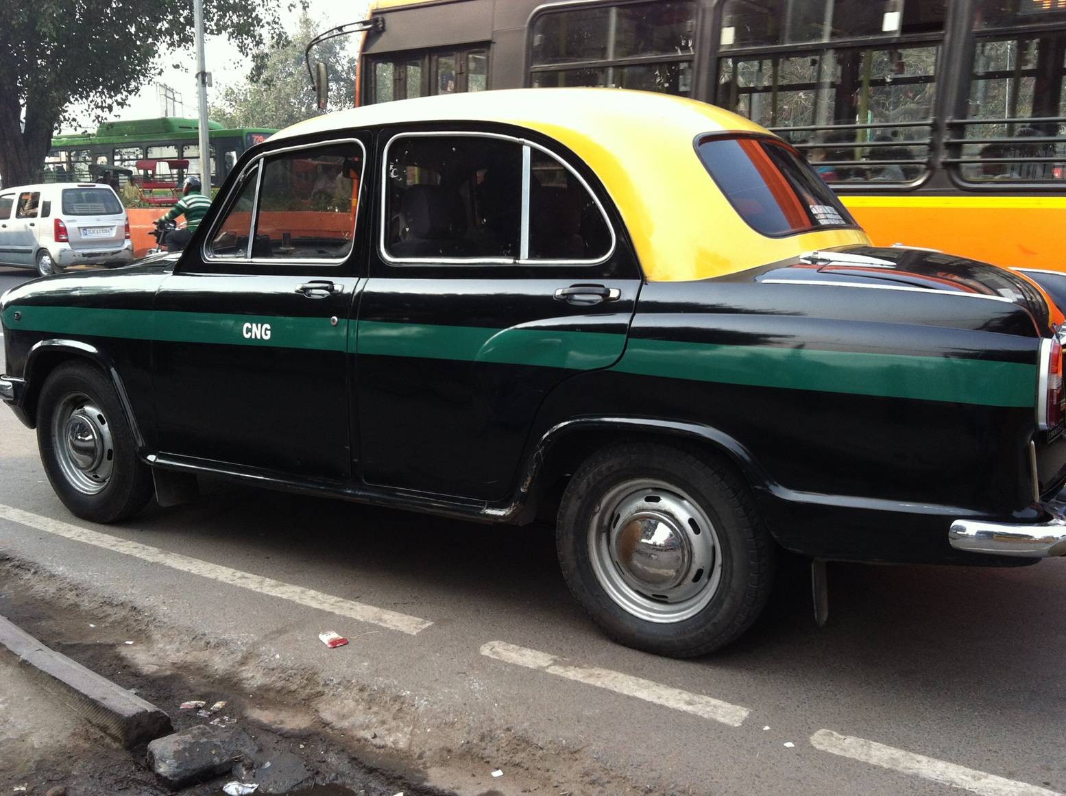 Typical carriage-type taxicab in New Delhi.